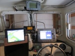 Ipad mount in viewing position for the captain with navionics chart plotter.