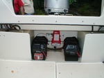 Batteries mounted next to gas tanks, freeing up lazarettes. 