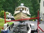 Using the G&G boat lift.  Attached to bow eye, lifted the boat off the trailer