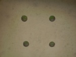 Bottom view of factory floorboards.  Holes were coated with epoxy.