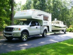 Another shot of Ford F150 4x4 with Northstar Freedom Truck camper, specifically designed for the 1/2 ton truck.  Camper has AC, Queen bed, two burner stove, hot water heater, cassette toilet, shower, dinette, sink, portable microwave (can be used on the boat) and Honda 2000 generator.  All the comforts of home.