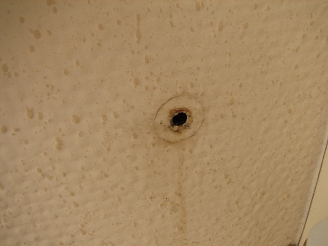 Hole, filled with clear epoxy, where 2\