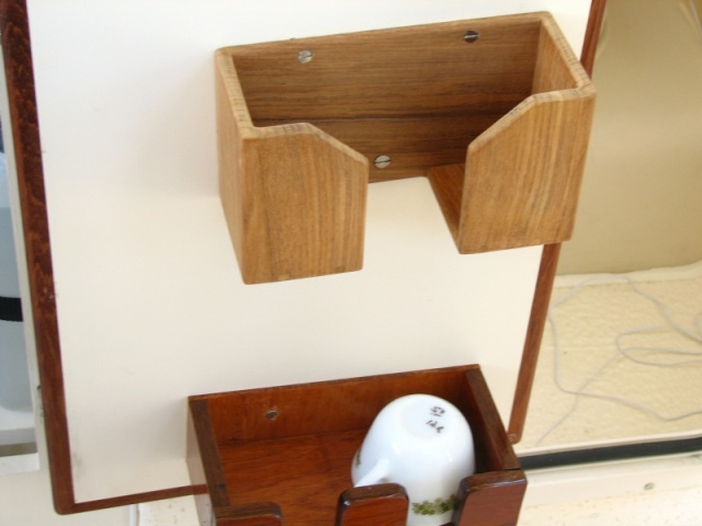 Bowl and cup storage on aft galley door