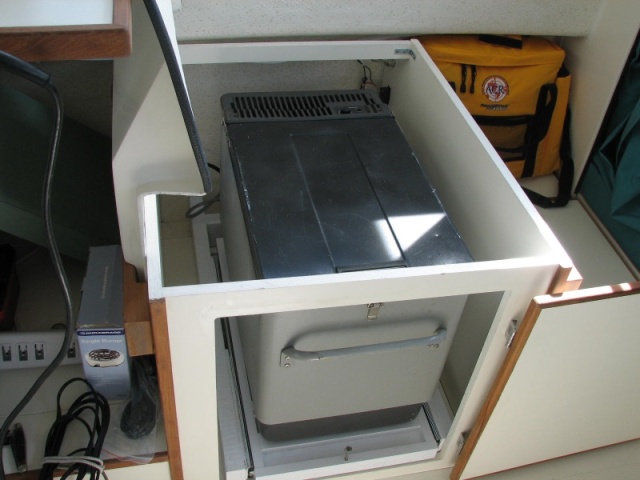 Refigerator/freezer under the seat, door open