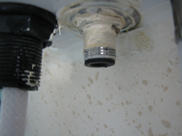brass input pipe to shower valve with compression washer and Bostic sealant