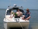 Break time...Preacherman Thaddeus and deckhand Joe lounging on deck.