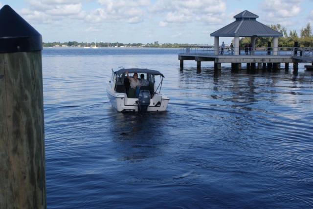 Happy...happy.  My friend John at the helm.