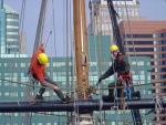 Top yard stern mast 120' off the water. Chad on the left I am on the right still drinking bean juice.