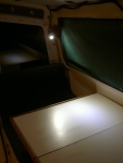 LED light illuminating table.  No flash.  Note: main cabin lights have 9 LEDs each and were purchased from www.sailboatstuff.com