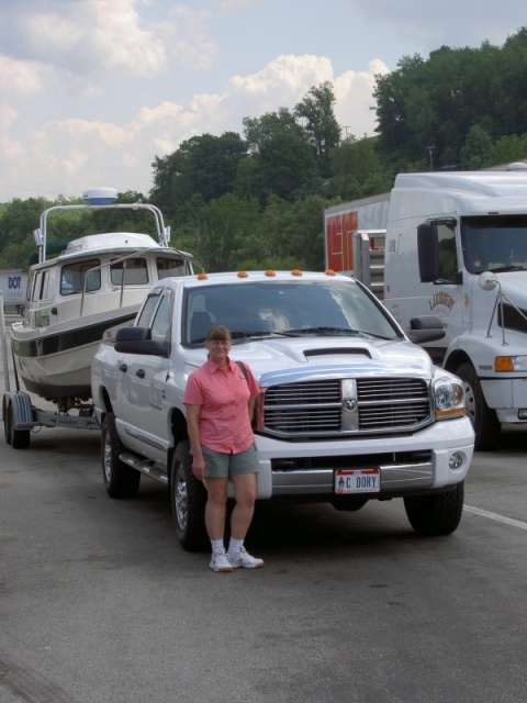Marcia w/new tow vehicle, Dodge Ram 2500  with TurboDiesel.  Can't tell Valkyrie is behind it on the road.