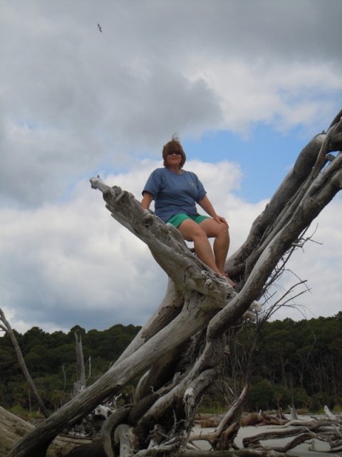 Marcia demonstrating childhood skills at Hunting Island SP. SC.