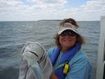 Marcia with the bigger brother of the shark in the previous picture.  She hooked and landed five sharks to four feet in a couple hours.  No big fish or keepers (SC min. is 54 inches), but lots of fun!  Especially on a seven foot, medium action rod with 10 pound test line.