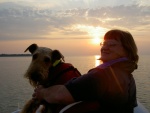 Marcia and Boomer on a sunset dinghy ride / Pelee Island, Ont. / Lake Erie