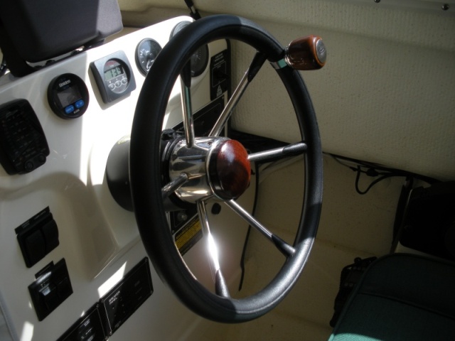 Teak steering wheel hub and spinner. 