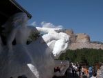 A scale model of Crazy Horse and the real thing in the backgound.