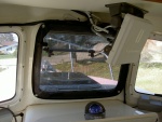 (Valkyrie) Forward window screen attaches with snaps.  A similar screen was made for the  forward hatch over the v-berth.