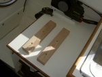 Raising the helm seat two inches.  I added oak supports and bought 4  machine screws (3