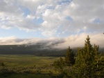 Evening clouds moving into the Big Horns, with a coming temperature drop of about 20 degrees.