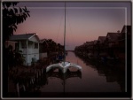 Corsair trimaran, BC (Before C-Dory), at our Texas home on the canal