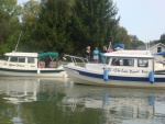 Last Dance and Knot Flying getting ready to settle in for the night at Spencerport New York Erie Canal 2009. The girls already pumping a local for info on the area.