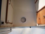 inspection hole with deck plate at the rear of the cabin
