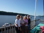 The Devil Sisters Becky, Paula, Ginny , Jess in Winterport Me. Friday the 13th of August 2010. Ginny getting the cootie sign from Jess, she's a bad one!