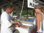Jeff and Jo filleting the catch