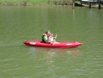 Kathy and Claire (OTTER) cruise the creek