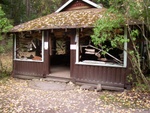 Building on Wallace Island filled with makeshift boat plaques