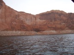 Houseboat and canyon wall.