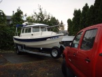 Tight fit in the driveway, Honu's temporary moorage.