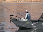 The masked fisherwoman