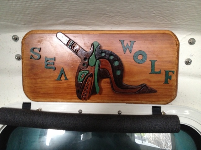Sea Wolf sign mounted over door