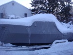 Winter 2010 over 70 inches of snow so far this year we are ahead of Buffalo for total inches of snow. The cover is doing a fine job. Heater inside the boat is keeping it toasty on the inside.