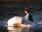 (Pat Anderson) Patty Motoring the Dinghy