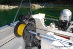 Stern tie reel mount using boat hook - simple! 
July 2010
