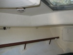 V-berth showing vent tiles that extend under cushions.