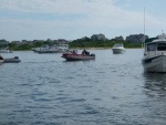 New Harbor in Block Island, this guy (Aldo) who bellows in  Italian,let's go and is selling pastries, breakfast sandwiches, bread all very good going boat to boat in the salt pond on Block Island. This place is packed for the fireworks on July 3rd. 1500 boats the town is packed great scenery of all kinds,I'm sitting on my boat loving life as I write this caption 