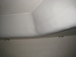 1/8th inch thick adhesive foam tape applied to overhead in v-berth