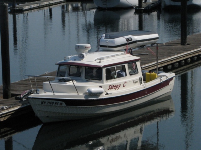 Finally with the inflatable rack on and the Wolverine up and in place.  Original, and, I like it.  Still working out the added aft weight and the anchor light  visibility from aft was marginal so a taller (36