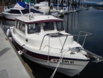 SleepyC (aka Jim's Dorie) moored at Island Marine Center, Fisherman's Bay, Lopez Island for the Opening Day CBGT, our first CBGT, first Strait of Juan crossing. 