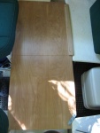 Bed extension (1/2 inch birch ply) resting on oak 1x2 on seat boxes; piano hinge allows unit to fold for storage.