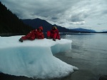 NIck and David ON some cool ice!  OK, it is not safe to be climbing around on ice bergs, they may roll.  This one is actually grounded, I am photographing from the beach!