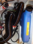 SMALLER BLACK HOSE TO THE RIGHT OF RED TAPE COMBUSTION AIR INTAKE, INSTALLED SAFETY POWER CUTOFF SWITCH SEE RED LEVER FOR OFF AND ON ABOVE LEFT SIDE OF THE PICTURE