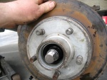 Apply a little grease to the hub or seal before sliding onto hub.