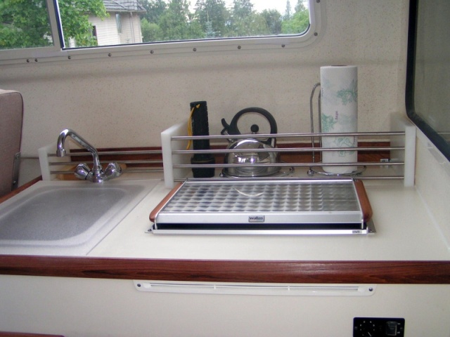 (Pat Anderson) Galley Storage by Fred on Anita Marie Installed by Patty, Sink Cover Cutting Board by David on Anna Leigh