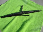 Old bad wiper blade in holder