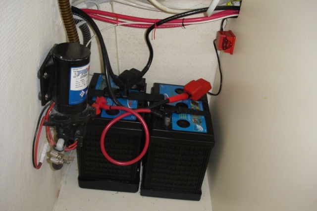 New, 6V house batteries, installed in the hanging locker.