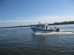 Kerri On with afterburners lit  wot on a blessedly flat sacramento river.  Steve  (sea spray) took shot.  31+ mph