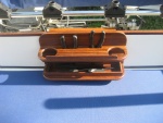 Teak,epoxy saturated,polyurethane finished, fishing tool and beverage holder.